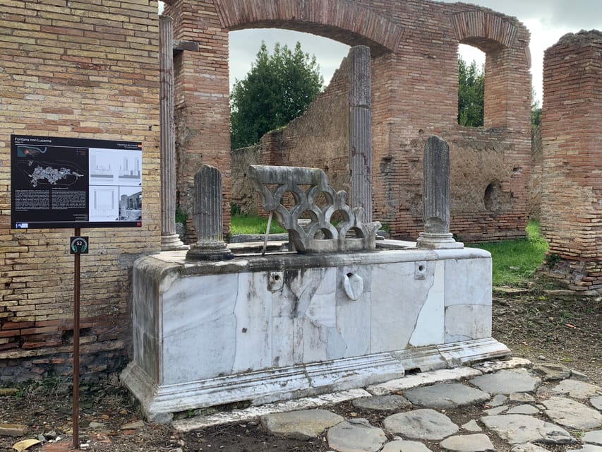 Archeological Area of Ostia Antica Entry Ticket - First Stops That Pay Off: Decumanus Maximus and the Baths of Neptune