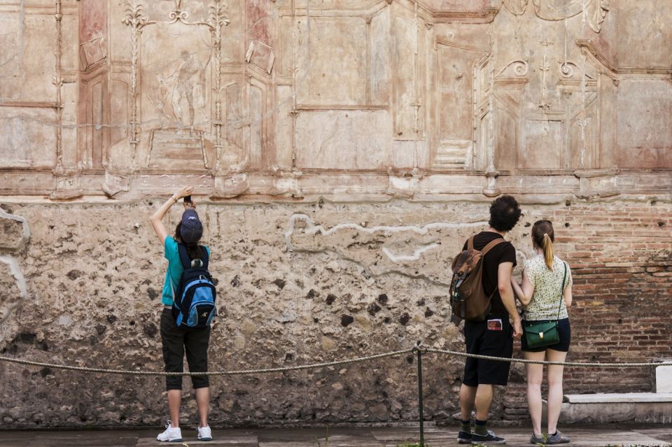 From Rome: Pompeii and Herculaneum by High-Speed Train - Pompeii guided highlights: plaster casts, a brothel, and big-city layout