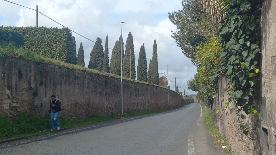 Rome: Appian Way Golf Cart Tour with Roman Catacombs Entry - Aurelian Walls and Pyramid of Cestius: The City’s Edges Close the Loop