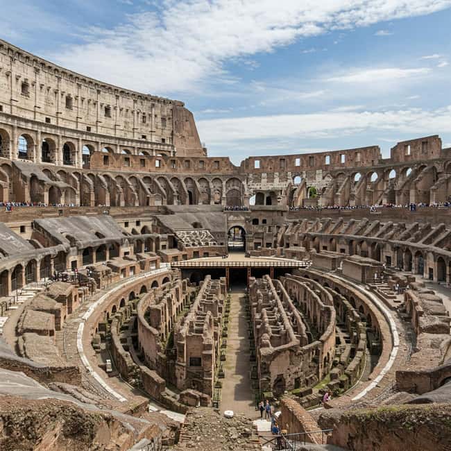 Rome: Colosseum and Ancient Rome Guided Walking Tour - Gladiators and the Arena: The Stories Behind the Stone